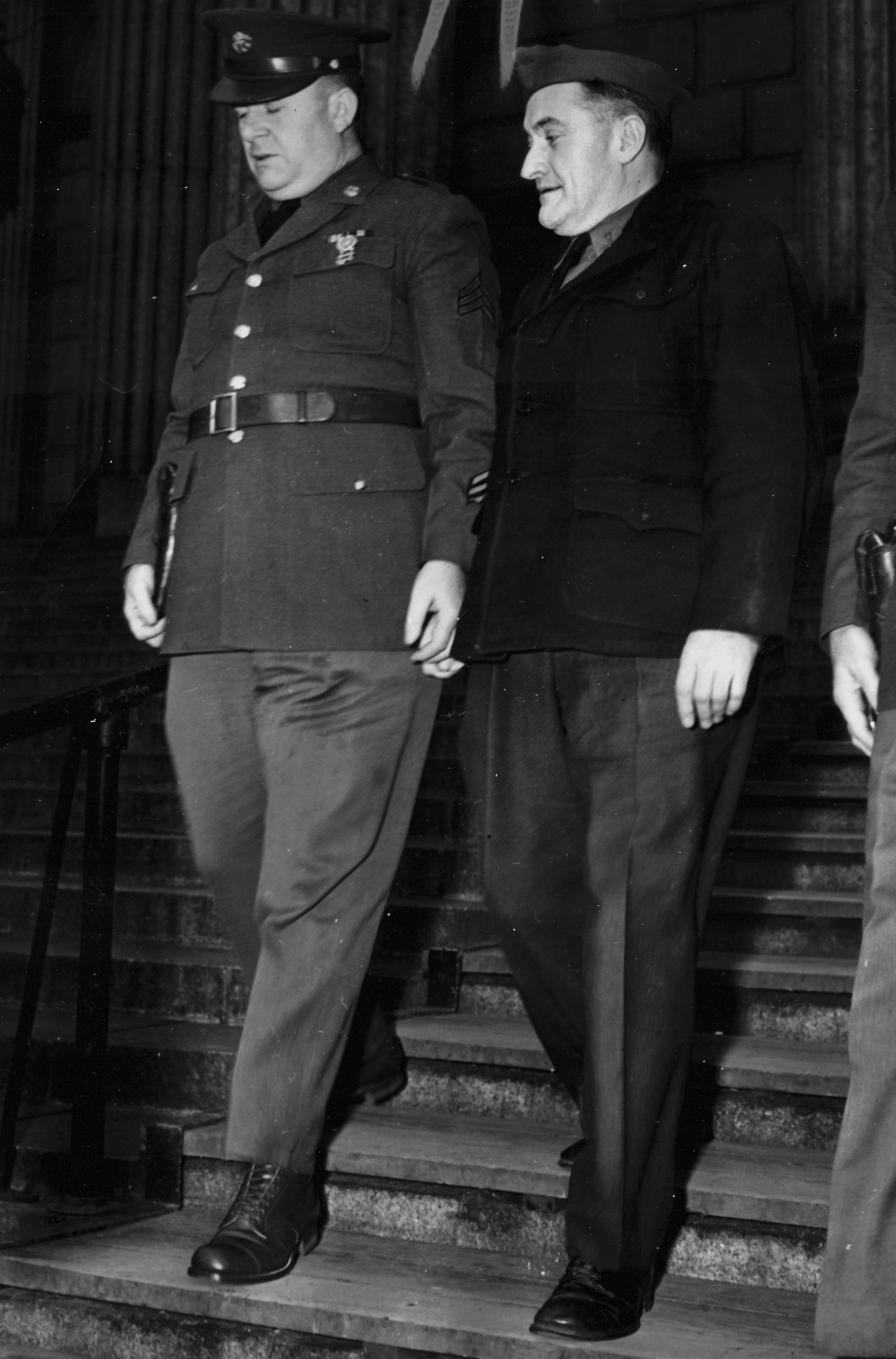 Attorney Harry Weinberger represented Bergdoll
        at this second trial by courts-martial. After the
        proceedings were over, Weinberger sued Bergdoll
        for failing to pay him his $75,000 legal fee. In this
        15 April 1940 photograph, Bergdoll (right, in dark
        coat) leaves the Supreme Court in New York City,
        where he had appeared to answer Weinberger’s
        lawsuit. (Photo courtesy of author)